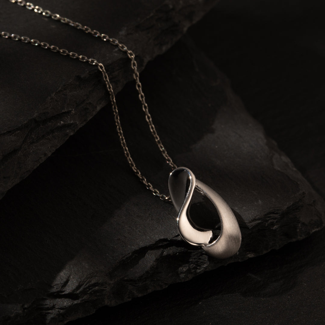Sterling Silver Curled Open Dewdrop Pendant